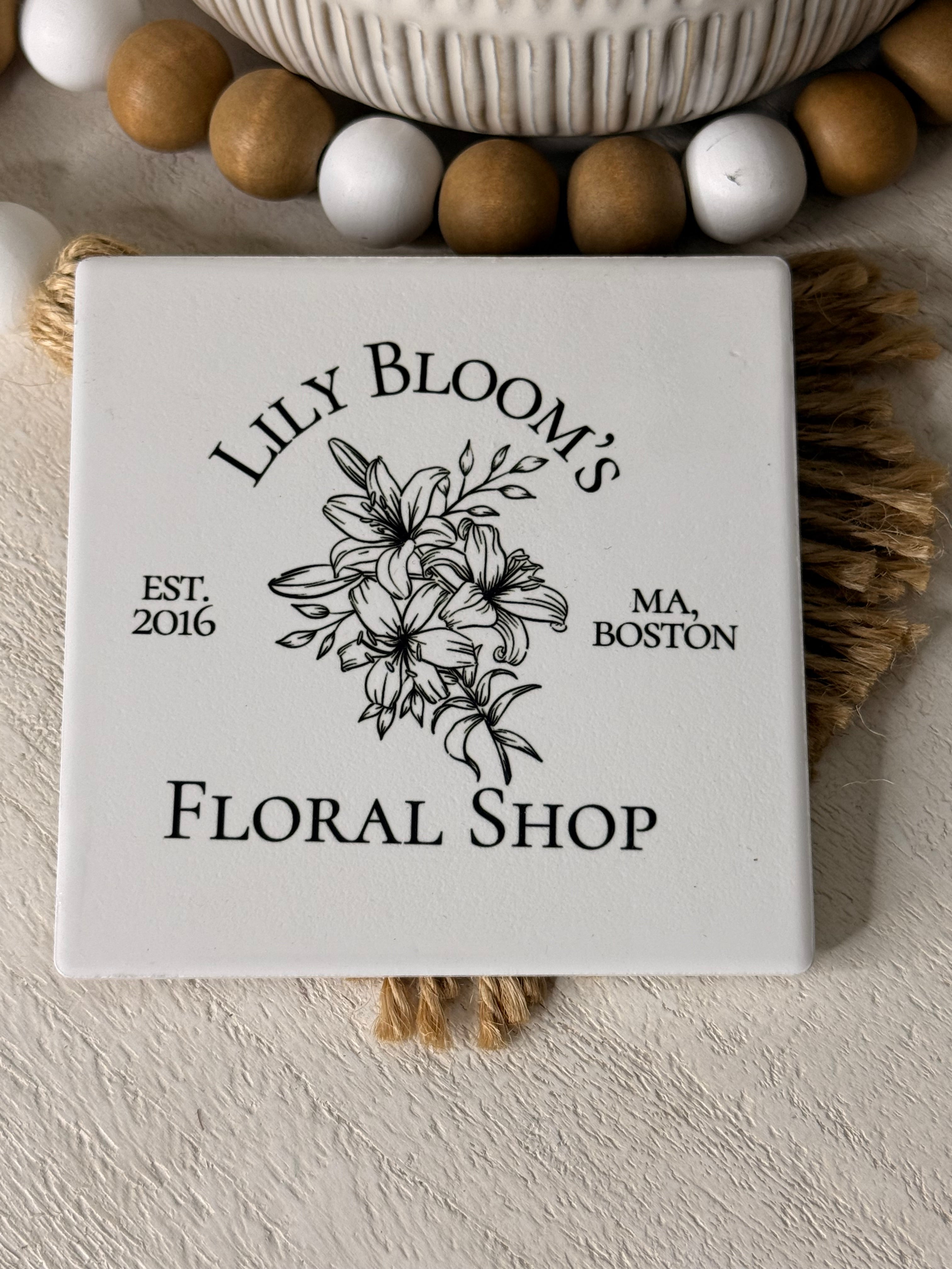 Lily Bloom’s Floral Shop Ceramic Coaster