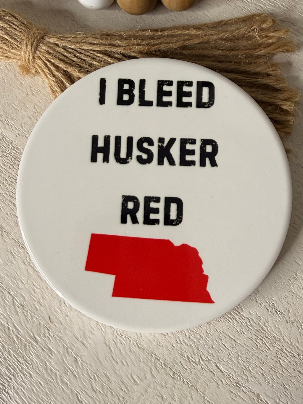 I Bleed Husker Red Ceramic Coaster