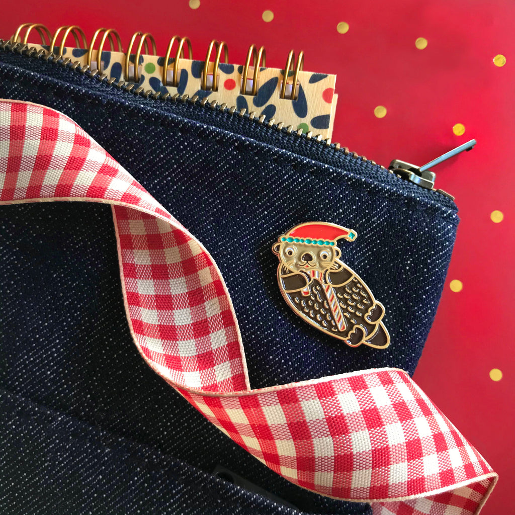 Santa Otter Enamel Pin