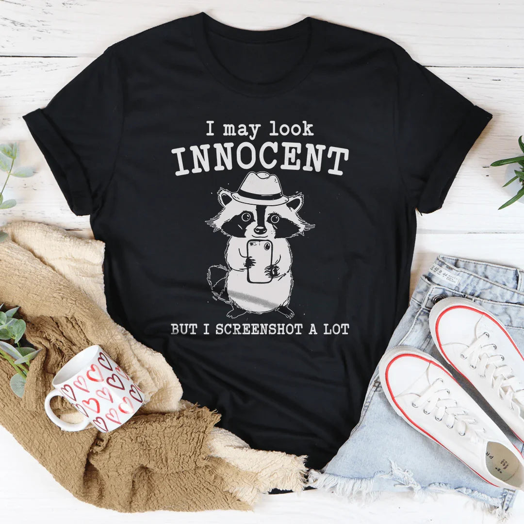 I May Look Innocent But I Screenshot A Lot Tee